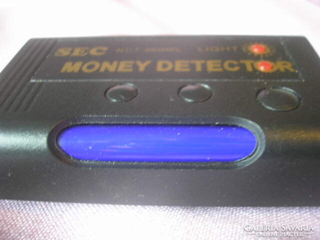 Retro pocket money detector fake banknote stamp detector for sale in a box with a uv lamp