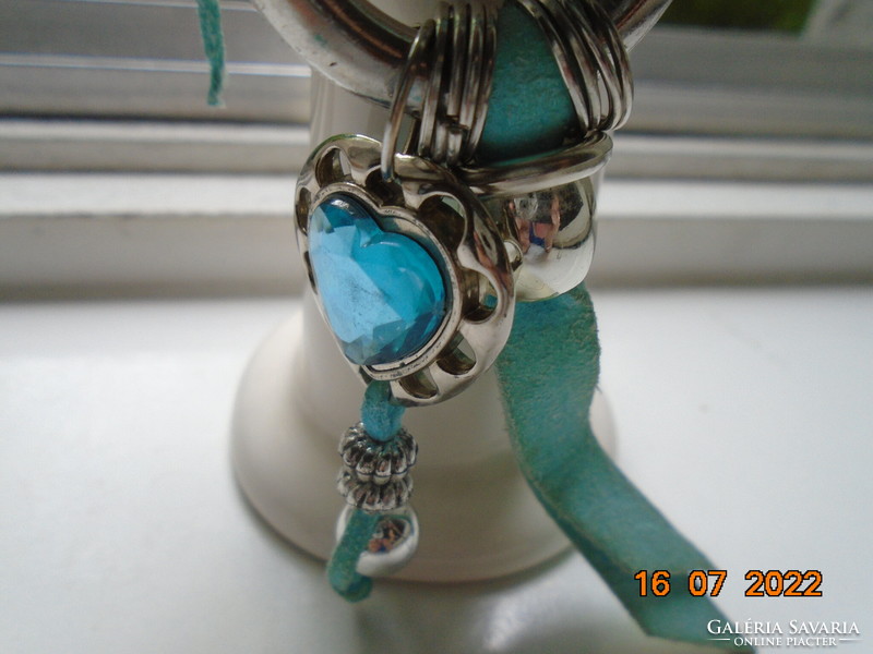 Turquoise stone silver-plated heart pendant, on a silver-plated large ring, with a turquoise leather cord