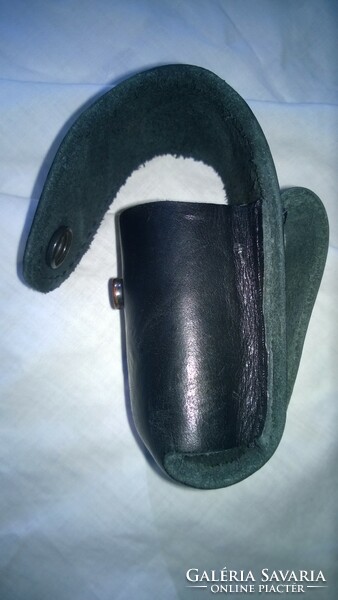 Leather holster can be hung on a belt for gas spray