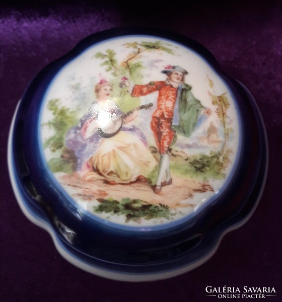 Romantic scene with porcelain box and box
