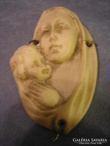 Mária, with your little one, you are Asian from an antique precious bone. African carving rarity can be given as a gift