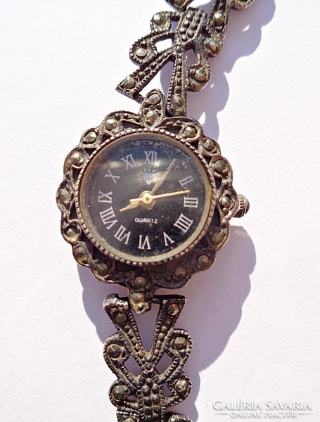 Silver watch with many marcasite stones