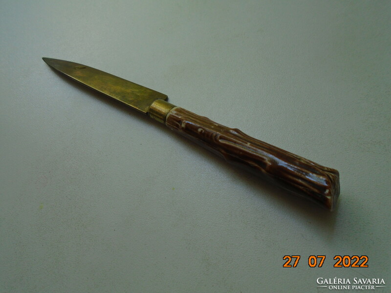 A stahl-bronze knife with a porcelain handle with a convex antler pattern attributed to Zsolnay