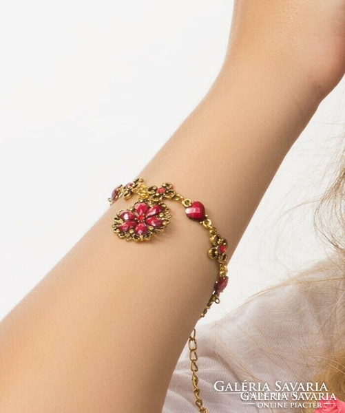 10 % Red flower bracelet, decorated with crystals.