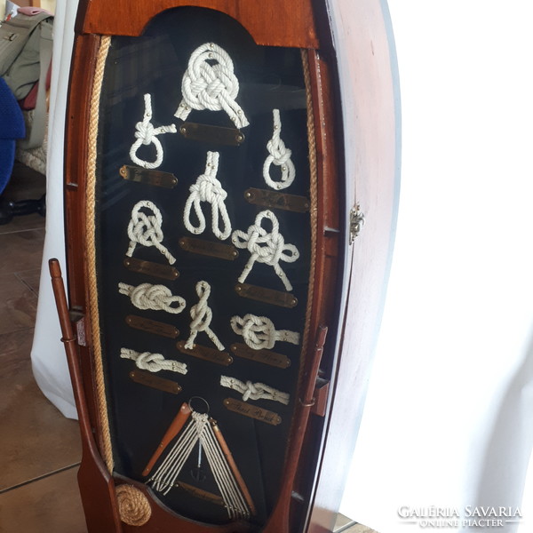 Wooden cabinet decorated with boat knots