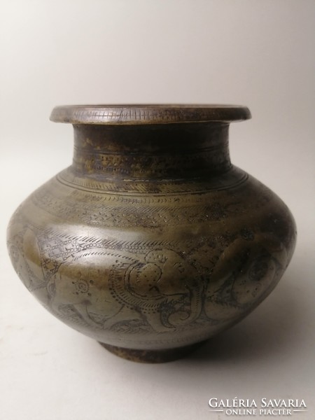 Antique bronze vessel with elephants