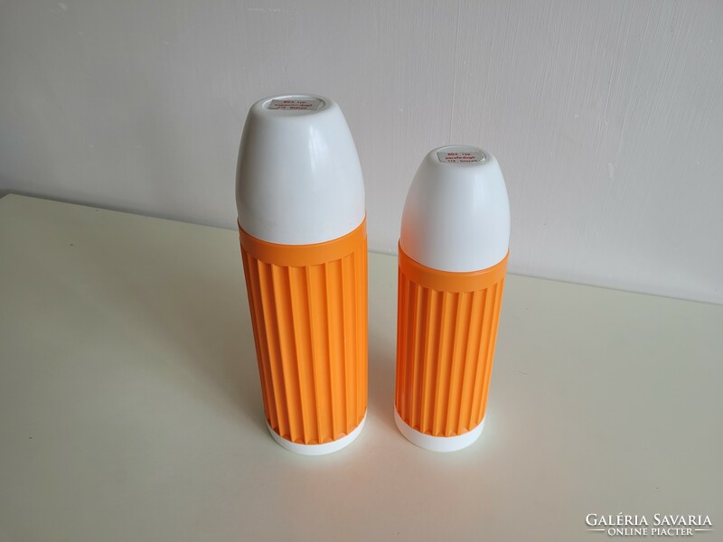 Old retro large size 0.75 liter orange thermos with glass insert