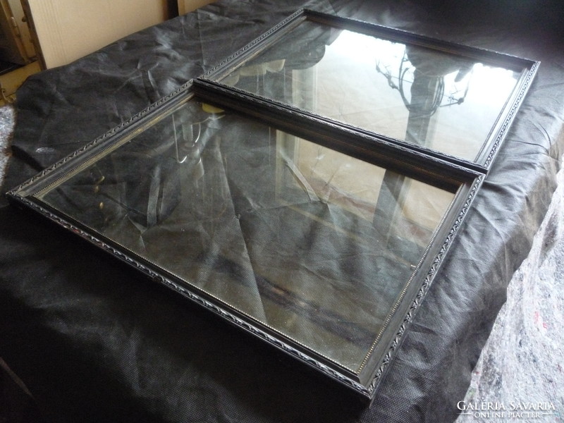 Pair of old black picture frames.