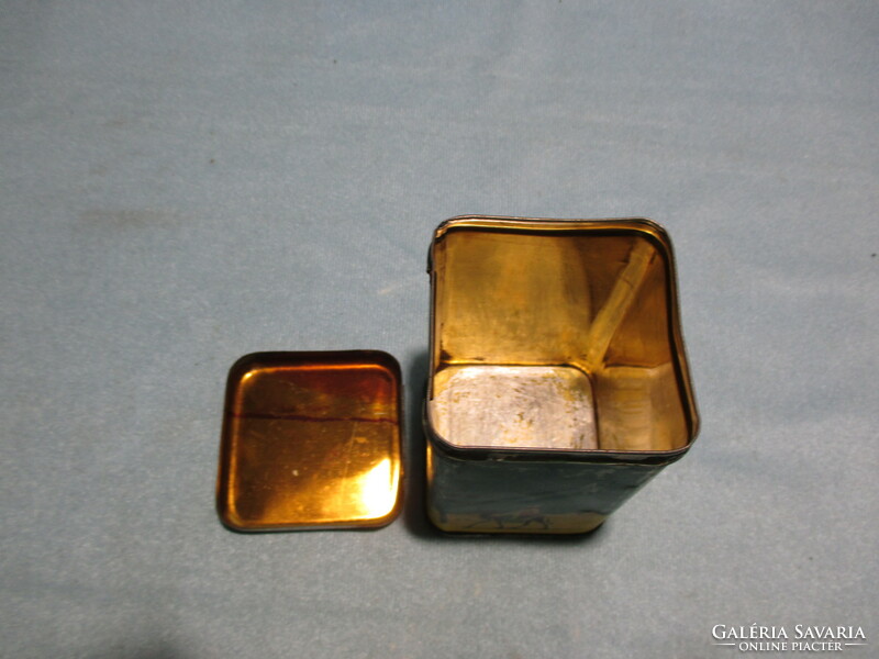 Old coffee metal box with a camel pattern, spice holder, storage