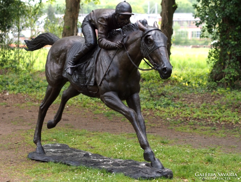 Jockey on a horse - life-size bronze statue