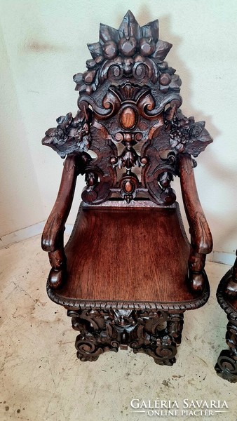 A557 antique, renaissance-style sgabello chairs with richly carved arms