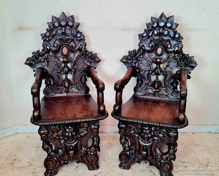 A557 antique, renaissance-style sgabello chairs with richly carved arms