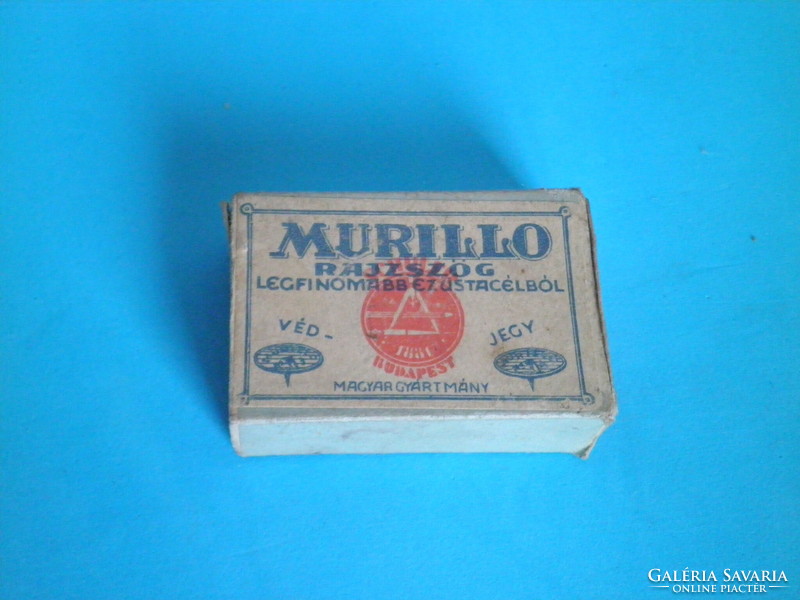 Murillo's empty box of drawing pins