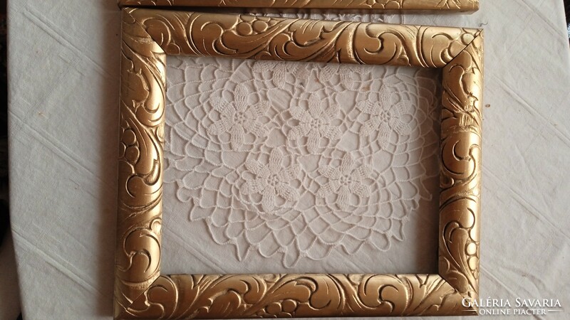 Antique gold painted deeply carved picture frame
