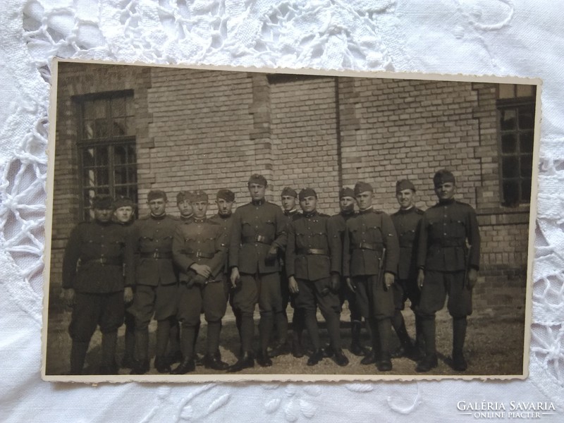 Antique soldier photo, a group of soldiers with the wellington logo on their backs