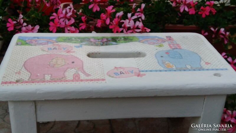 Decoupaged white wooden old stool and seat decorated with elephants and birds for children