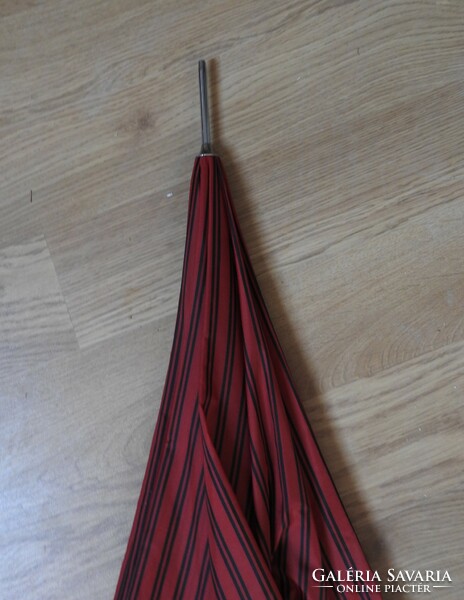 Red black striped umbrella with red leather handle