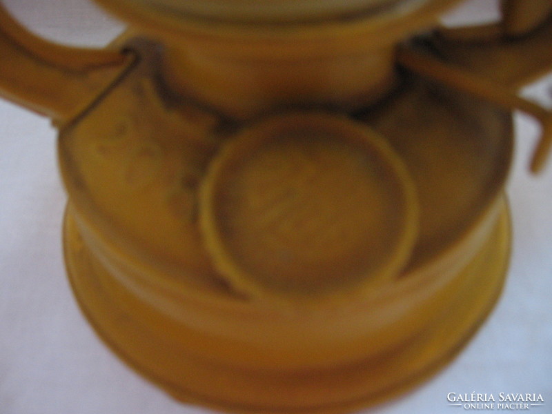 Old yellow Chinese storm lantern, kerosene lamp