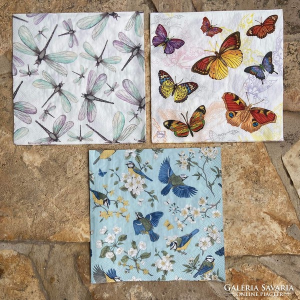 Colorful napkins with butterfly, bird, and dragonfly patterns for collectors