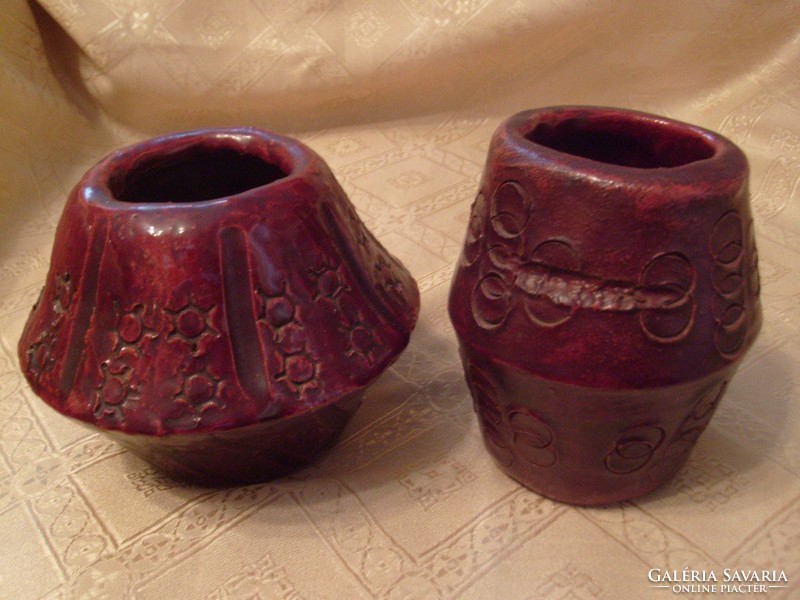 A pair of Art Deco glazed terracotta vases marked at the bottom are sold together