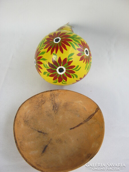 Autumn decoration with painted ornaments and coconut bowl
