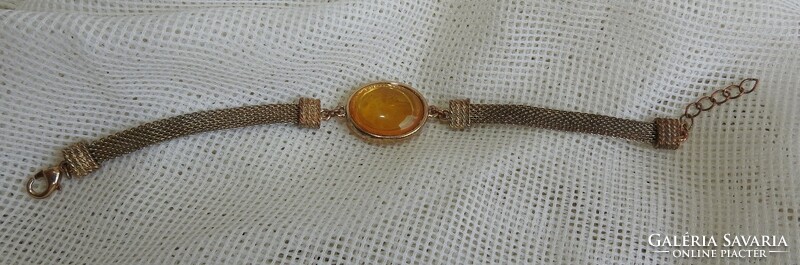 Yellow stone bracelet in silver color