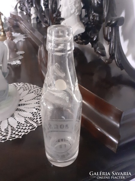 Old syrupy soda bottle