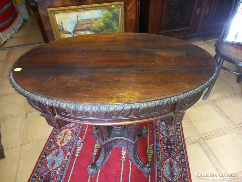 Baroque carved oval table.