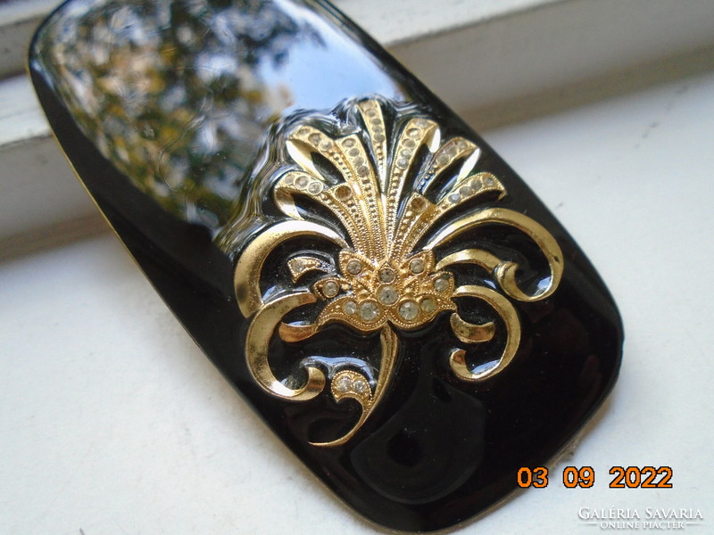 Designer art deco gilded black enamel dress jewelry, belt buckle with protruding stone spectacular flower