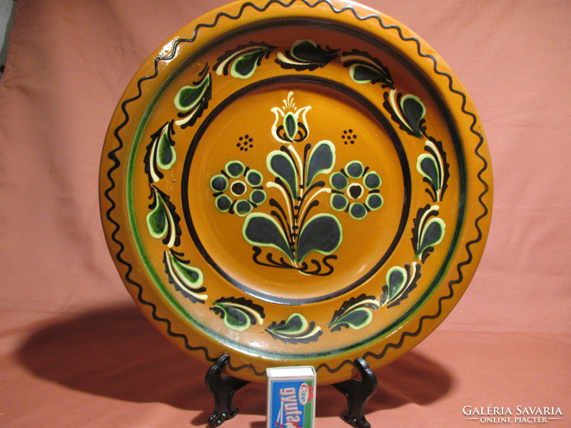 Large, juried ceramic wall plate