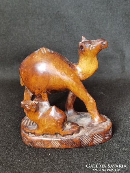 Old hand carved hardwood camel and calf carving