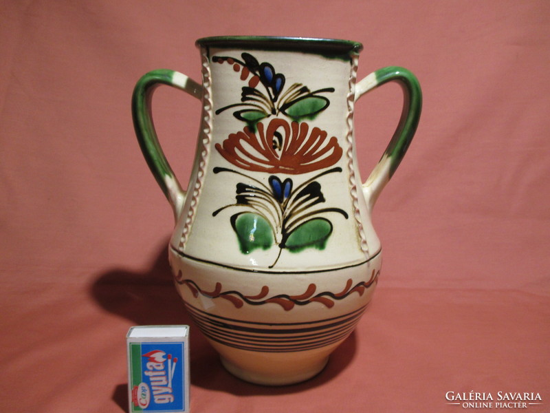 Ceramic vase with a handle