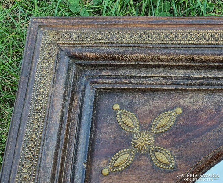 Indonesian mirror in a wooden frame...