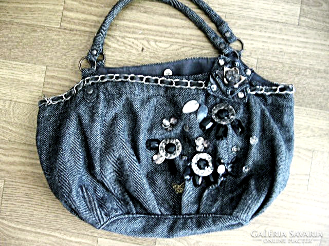 Tweed gray fabric accesorize bag with sewn ornaments