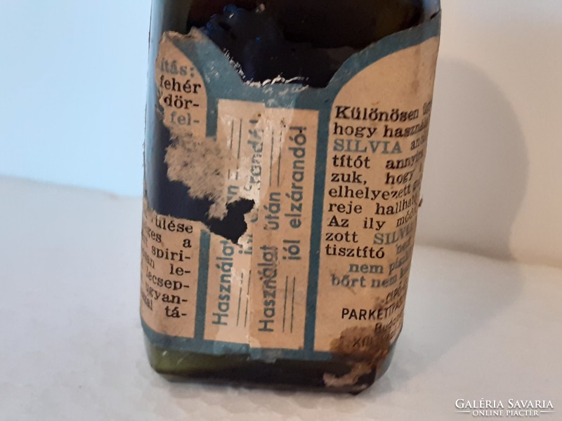 Old chemical bottle labeled silvia shoe polish bottle