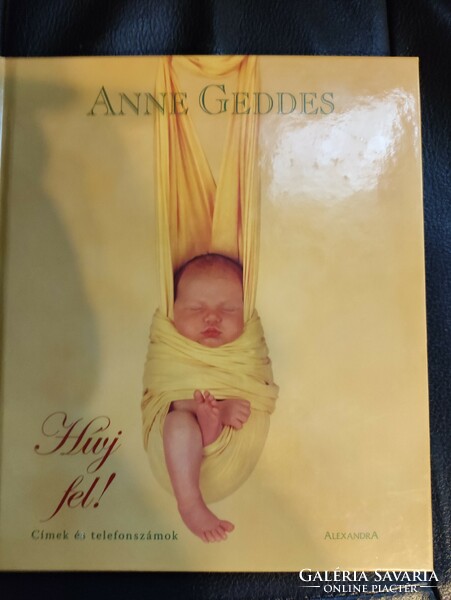 Addresses and phone numbers - Anne Geddes with children's photos.