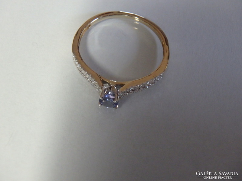 14K gold tanzanite ring with diamonds 0.130 ct