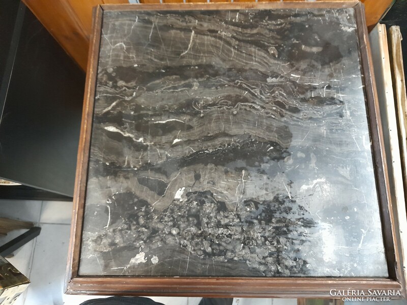 German black marble flat wooden table.