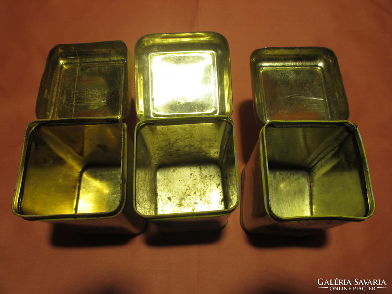 3 old metal spice boxes
