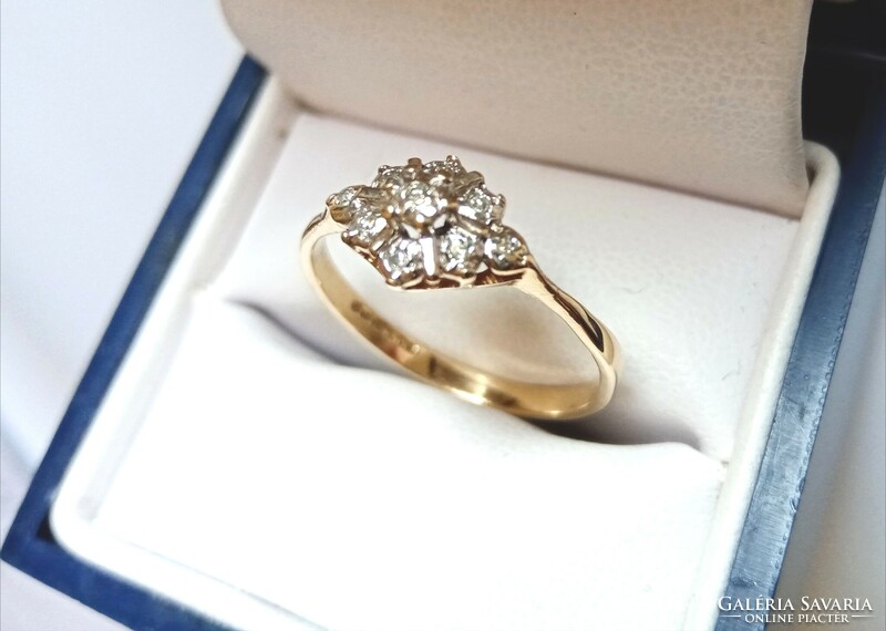 Gold ring with diamond stones