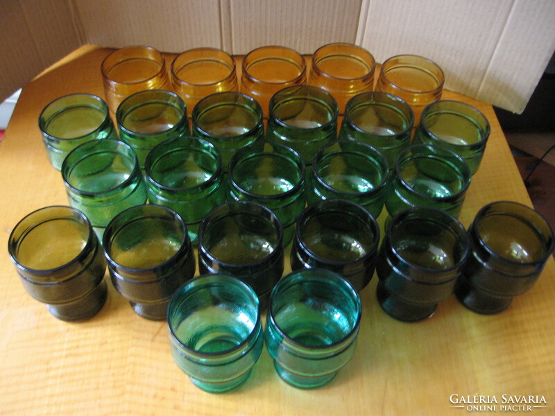 Retro mixed colored fidenza Italian wine, water, soda glasses, candle holders