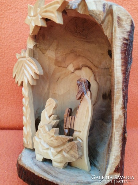 Hand-carved wooden manger. Decoration. Wood carving..Christmas decoration.