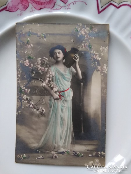 Antique hand colored photo sheet / postcard of beautiful lady in greek style dress with jug 1911