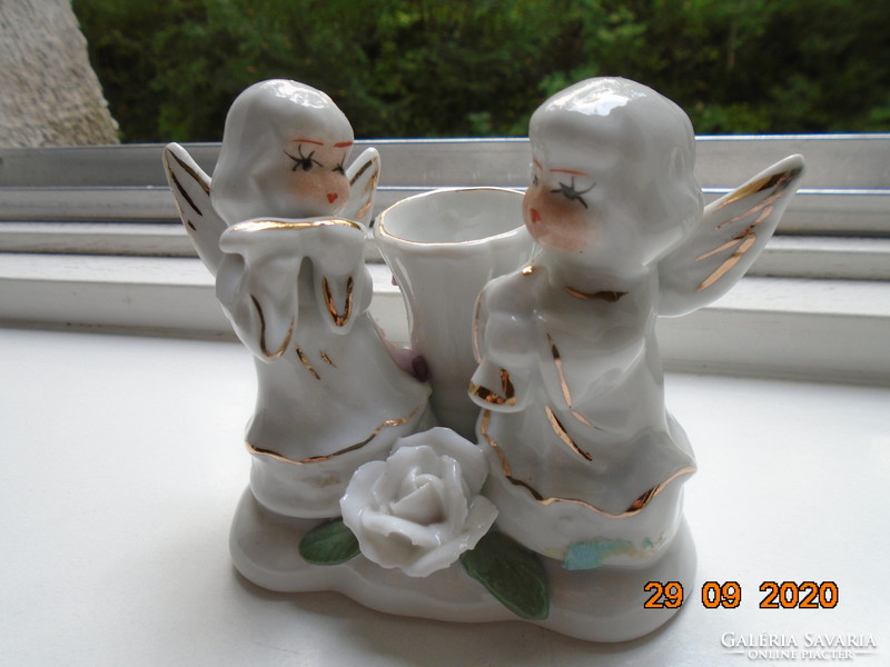 Hand-made, hand-painted candle holders with two musical angels
