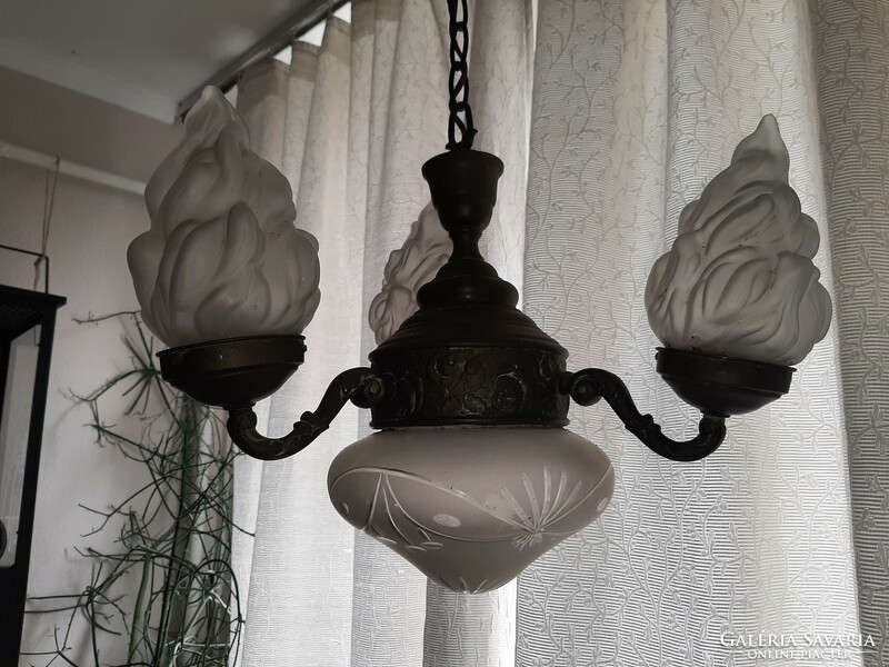 Beautiful rosy bronze chandelier with a polished glass shade and 3 flame-shaped shades