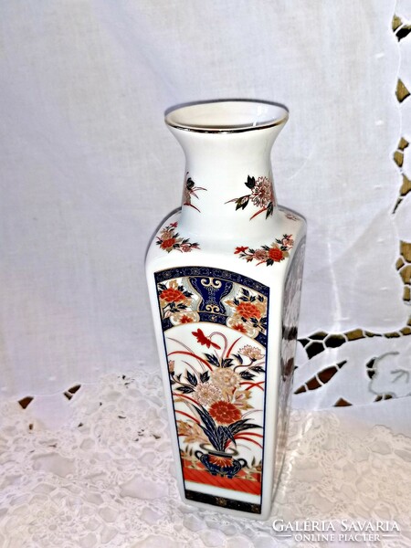 Vintage Imari porcelain, Japanese vase with characteristic red flowers