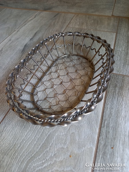 Old woven metal bread basket