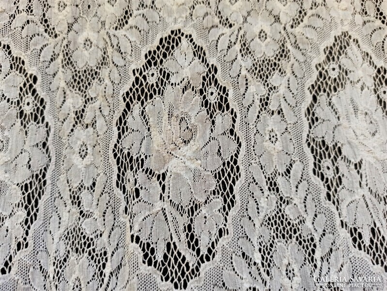 Long lace curtain with a skirt