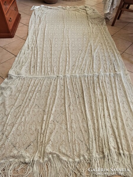 Long lace curtain with a skirt