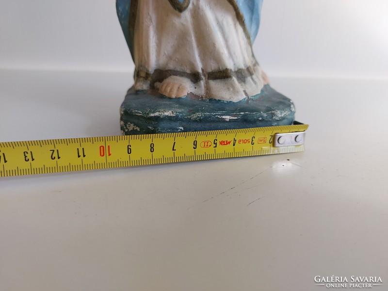 Old religious figure gypsum heart of Mary statue